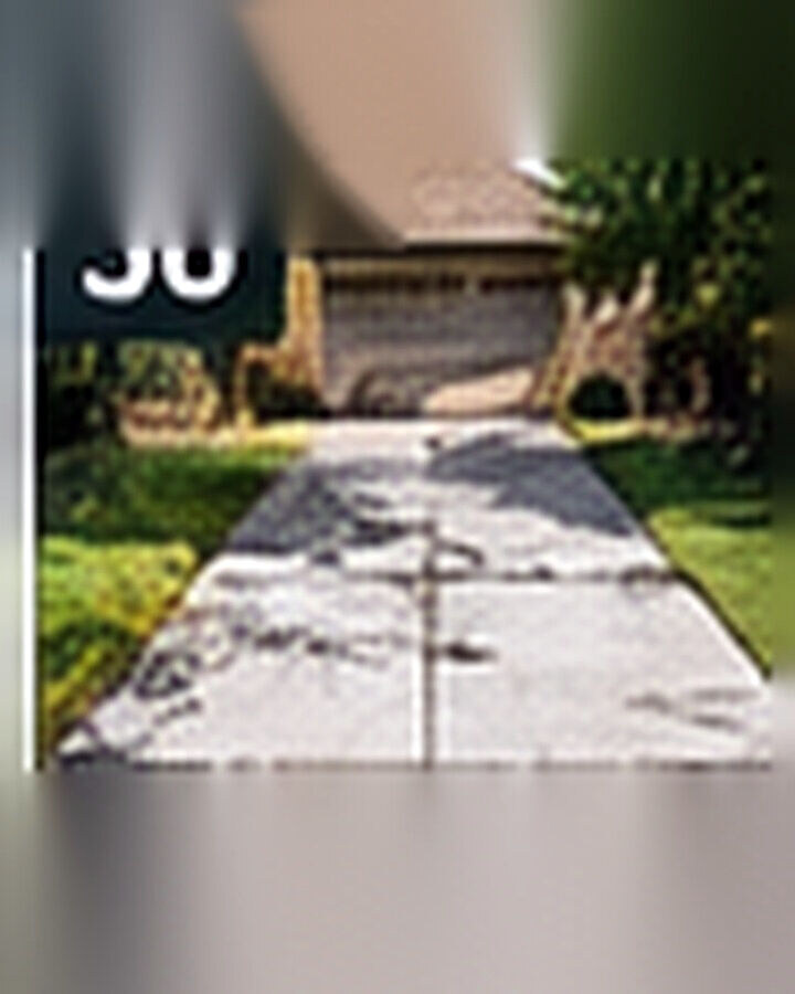 Before transformation: Cracked Driveway to Clean Modern Look: Improve Arrival Without a Full Overhaul