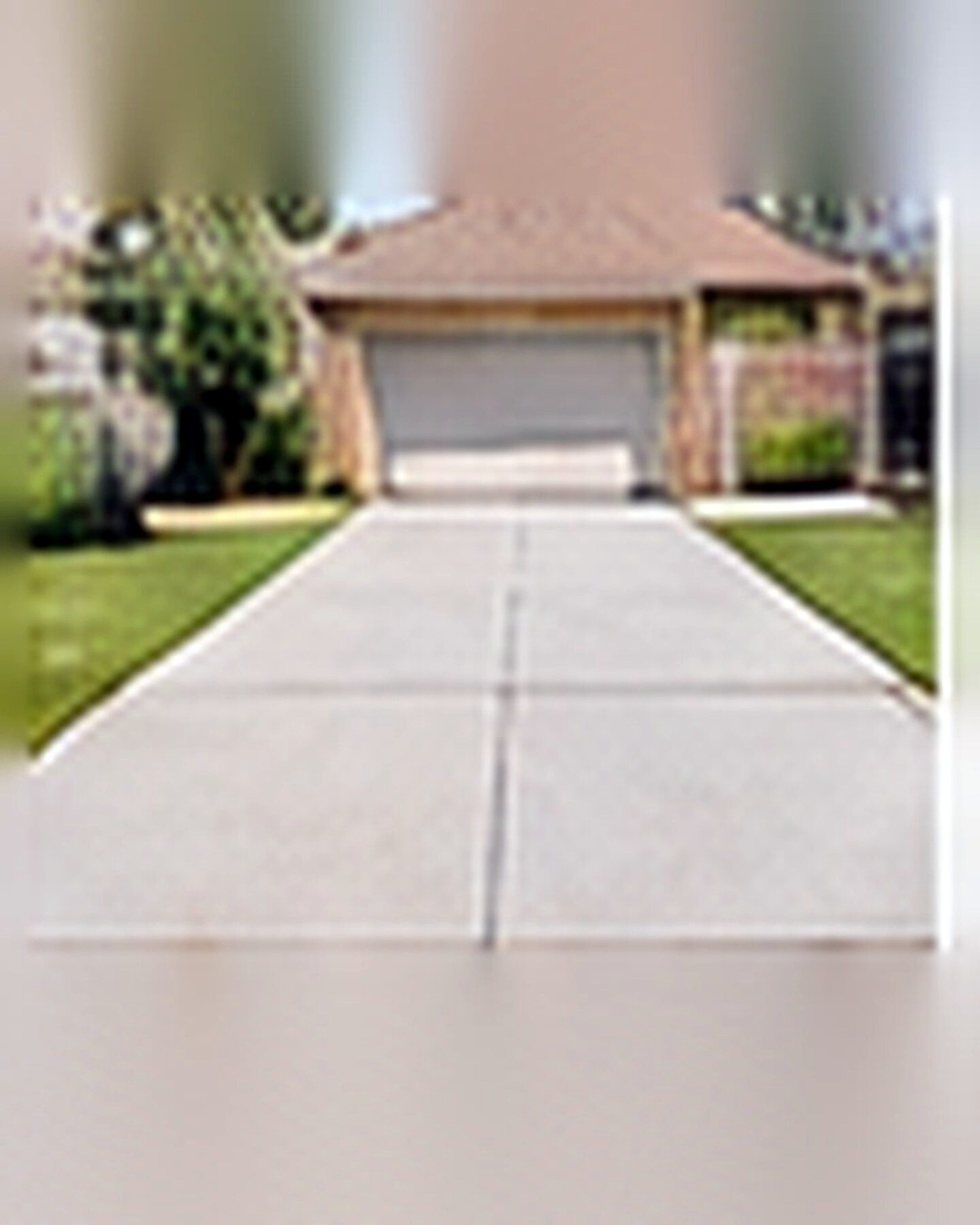 After transformation: Cracked Driveway to Clean Modern Look: Improve Arrival Without a Full Overhaul