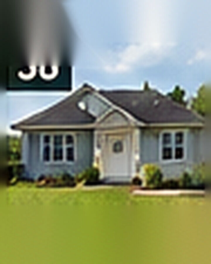 Before transformation: Faded Exterior to Fresh Modern Look: A Whole-House Curb Appeal Reset