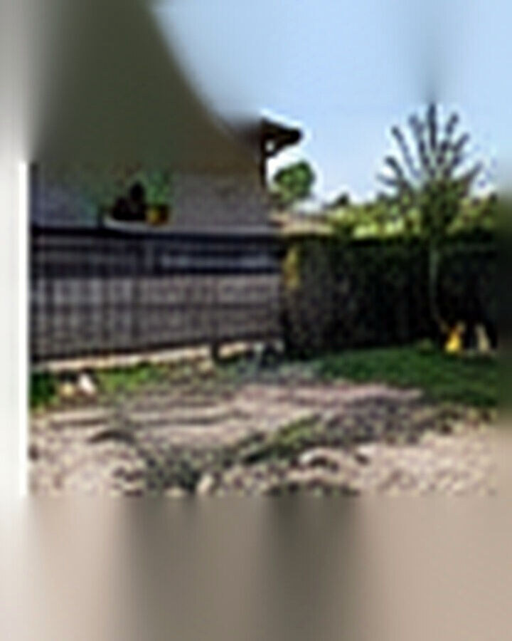 Before transformation: Small Backyard Patio Makeover: Turn a Plain Corner Into an Outdoor Living Retreat