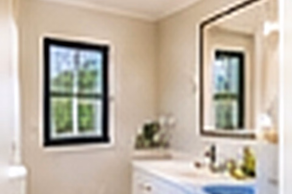 Small Bathroom to Spacious-Feeling Retreat: Use Light, Scale and Storage